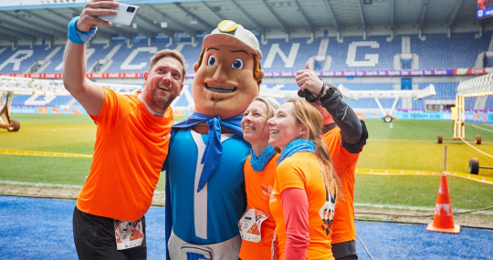 Selfie in stadion van KRC Genk tijdens 100km-run 2022